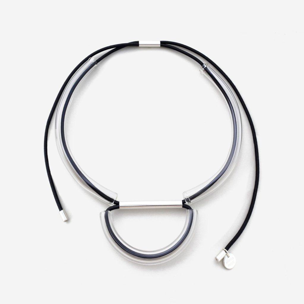 Necklace with black strings and crystal structures
